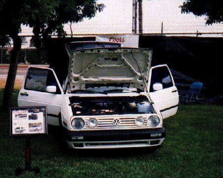 [PICTURE: My GTI at a car show] 